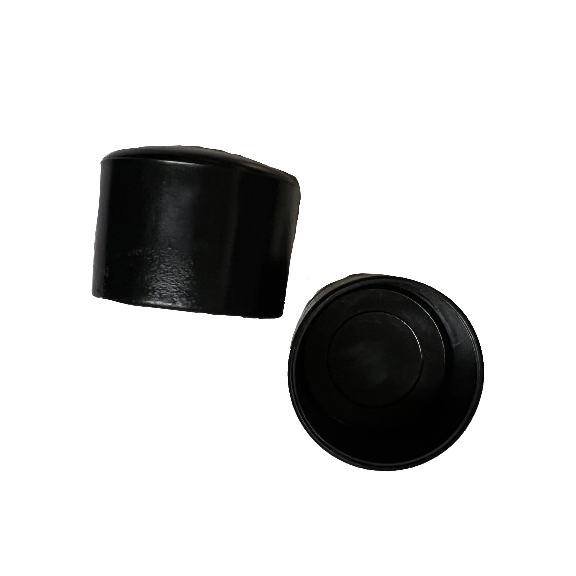 White and black Vivace vinyl pole cap shown both outside and inside views—smooth exterior cap and hollow interior lip to securely grip 1″ pole shafts.