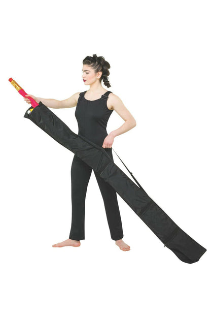 Model wearing black Guard Max bag across shoulder holding a red rifle inside; long padded nylon case with adjustable shoulder strap, zipper closure on top edge, and reinforced ends—designed to protect and transport color guard rifles.